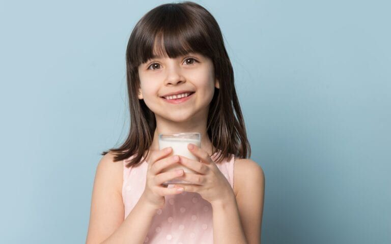Child With A Glass of Milk